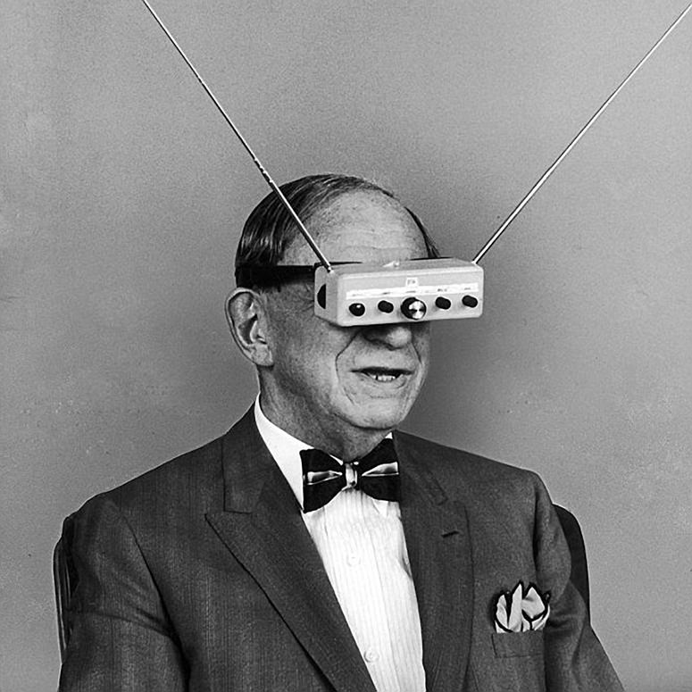 Man with first virtual reality glasses watching 3D images