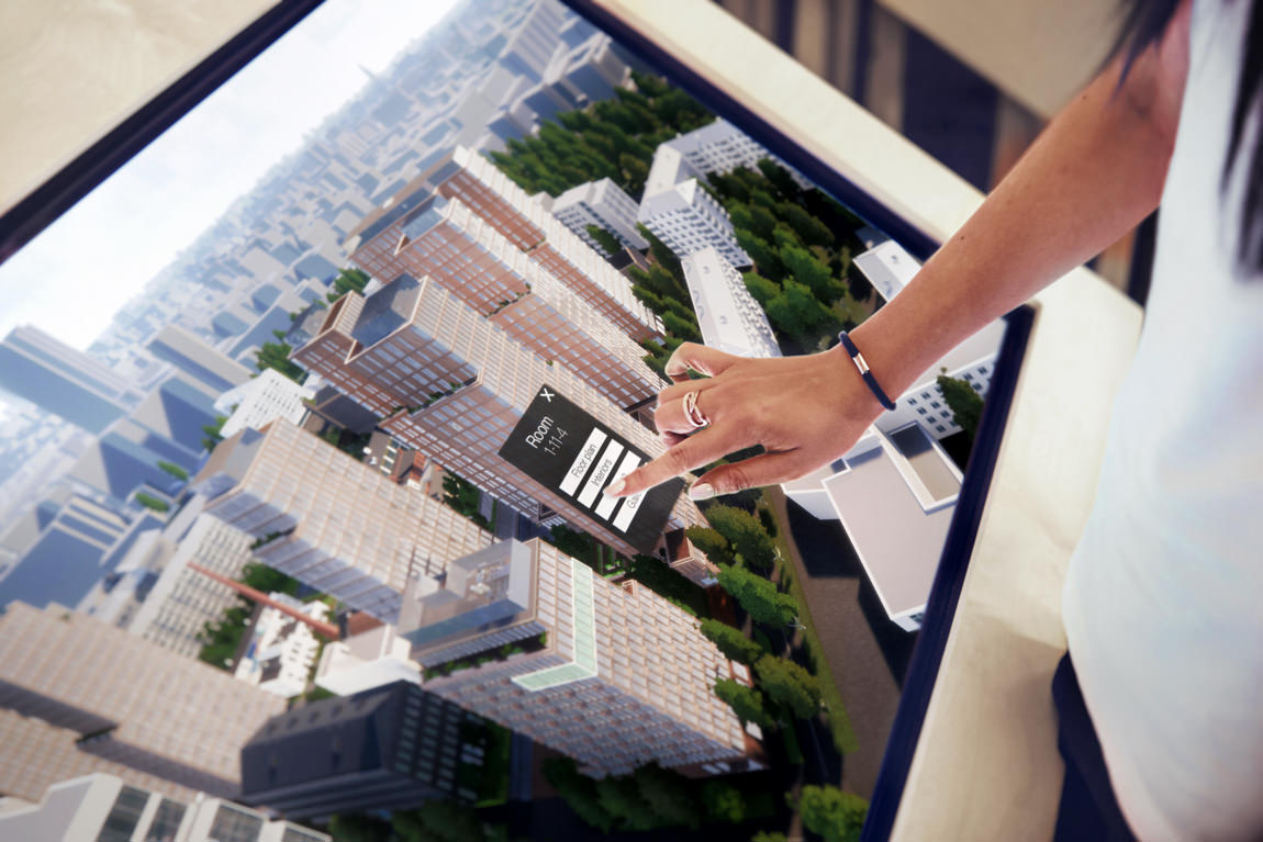 Real estate marketing application shown on big touchscreen display