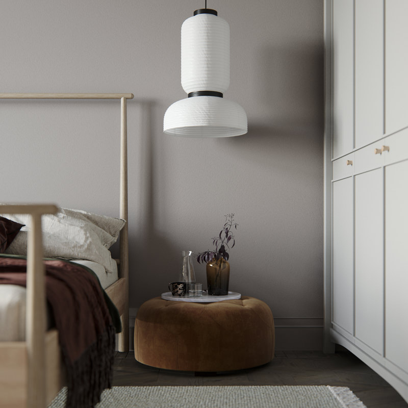 The souffle lighting fixture and the comfy ottoman welcomes you to the bedroom. The light colors delicately match with the darker ones creating a peculiar feeling of intimacy.
