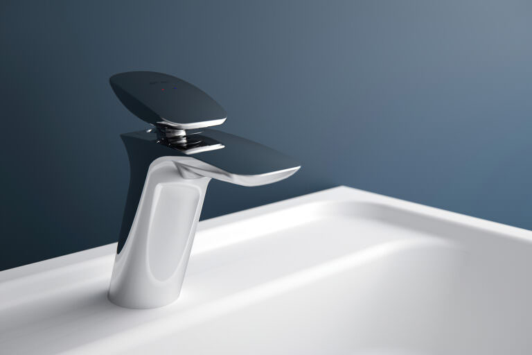 3D product visualization of a sleek modern tap pinned to a white washstand against a dark blue wall