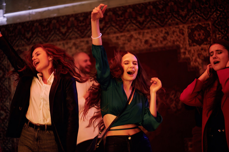 Project managers and CG artists dancing at the party