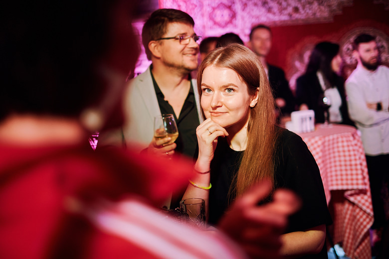 CG artist Nastya Petrovskaya standing near the table