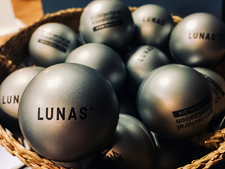 Silver ball with Lunas studio logotype